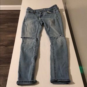 Light blue ripped jeans